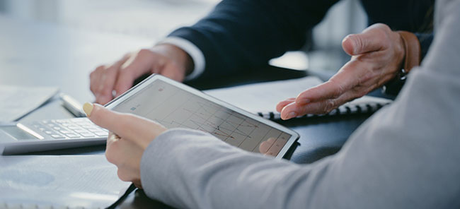 Close-up of a tablet showing a graph.